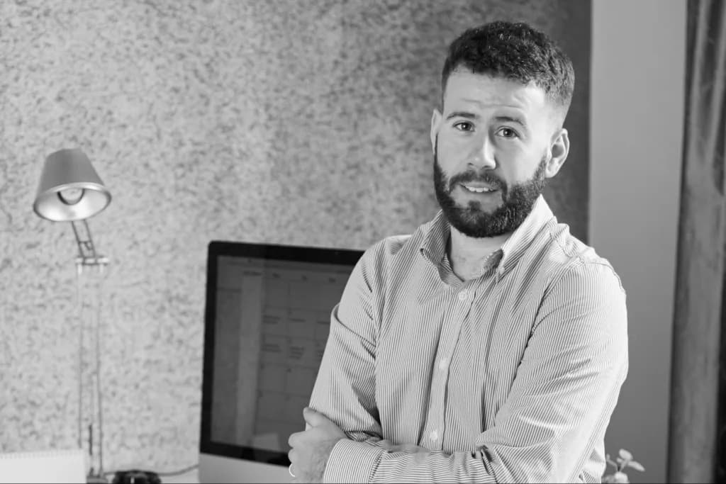 Managing director of Sitelog with arms crossed